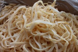 Цена на полоски сушеного подкопченного кальмара оптом